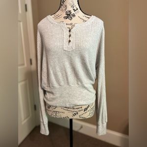 Thermal shirt with buttons at the top